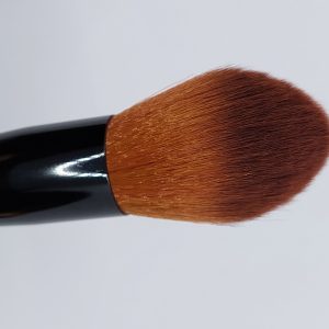 pinceau teint bombé